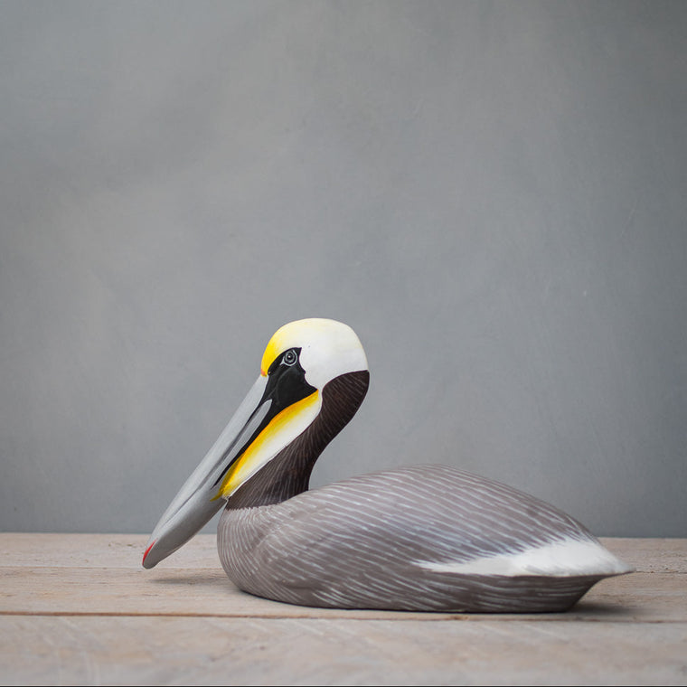 Hand carved wooden brown pelican medium sculpture 12 inches