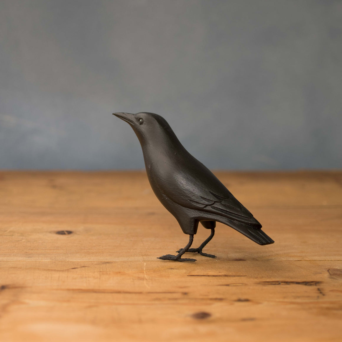 Hand carved wooden mini crow looking up 3.5 inches