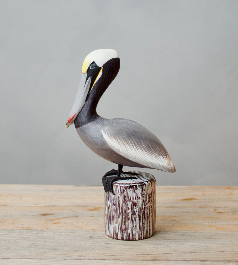 Hand carved wooden brown pelican on post medium 10 inches