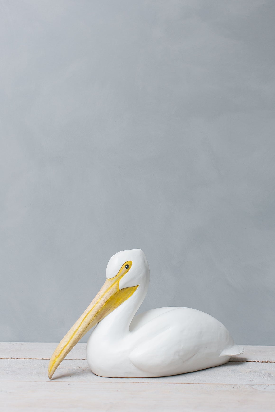 Hand Carved Wooden Brown Pelican on Post — Medium | 10"H